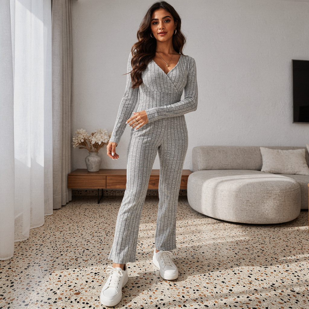 Grey ribbed knit two-piece set for women featuring a long sleeve V-neck top and flared pants, soft loungewear outfit.
