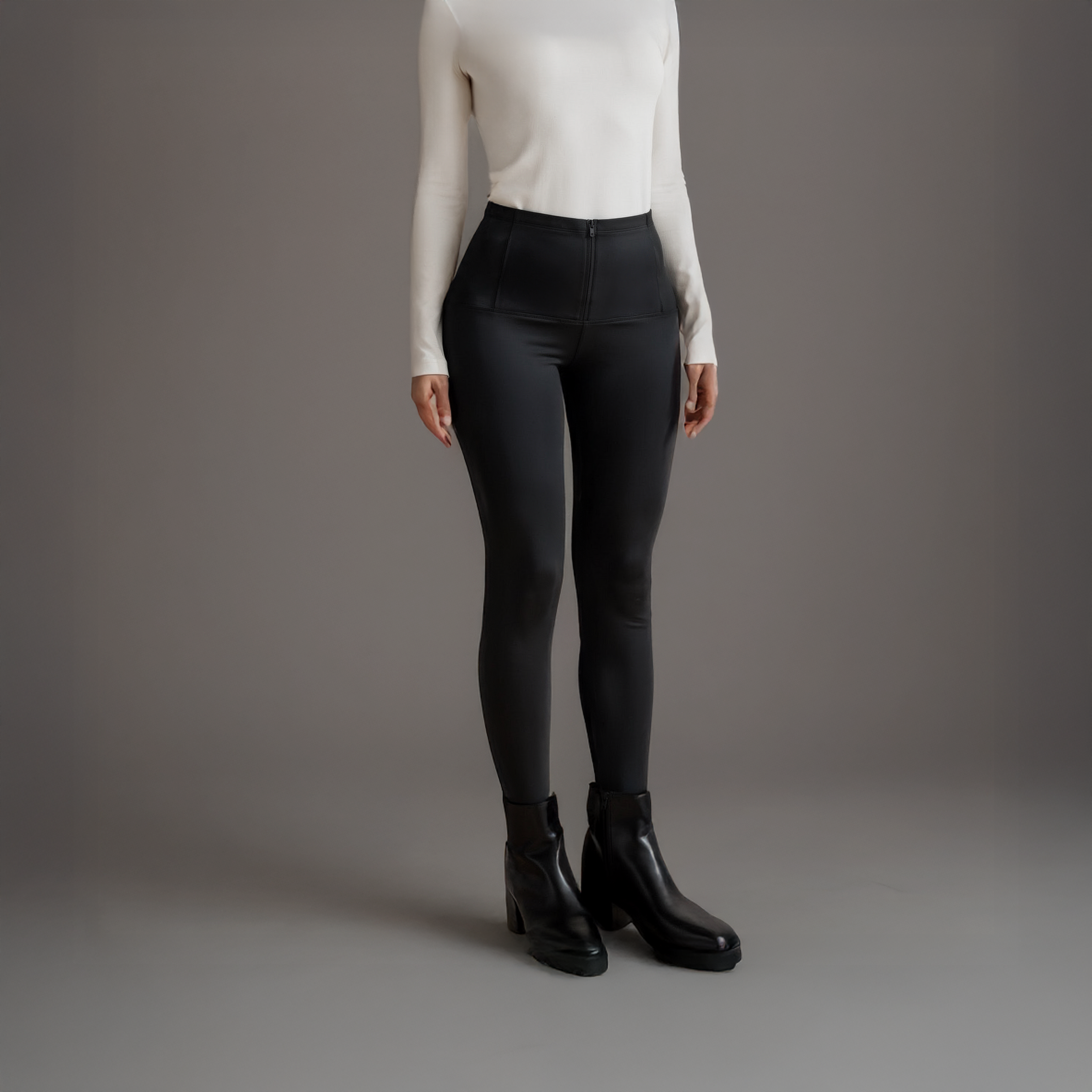 High-rise black sculpting leggings for women made from soft stretch fabric, designed for a sleek and supportive everyday fit
