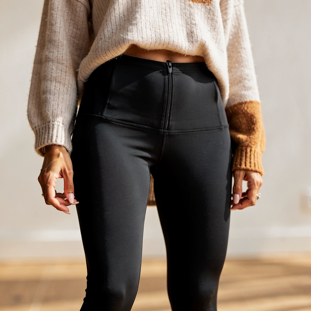 High-rise black sculpting leggings for women made from soft stretch fabric, designed for a sleek and supportive everyday fit
