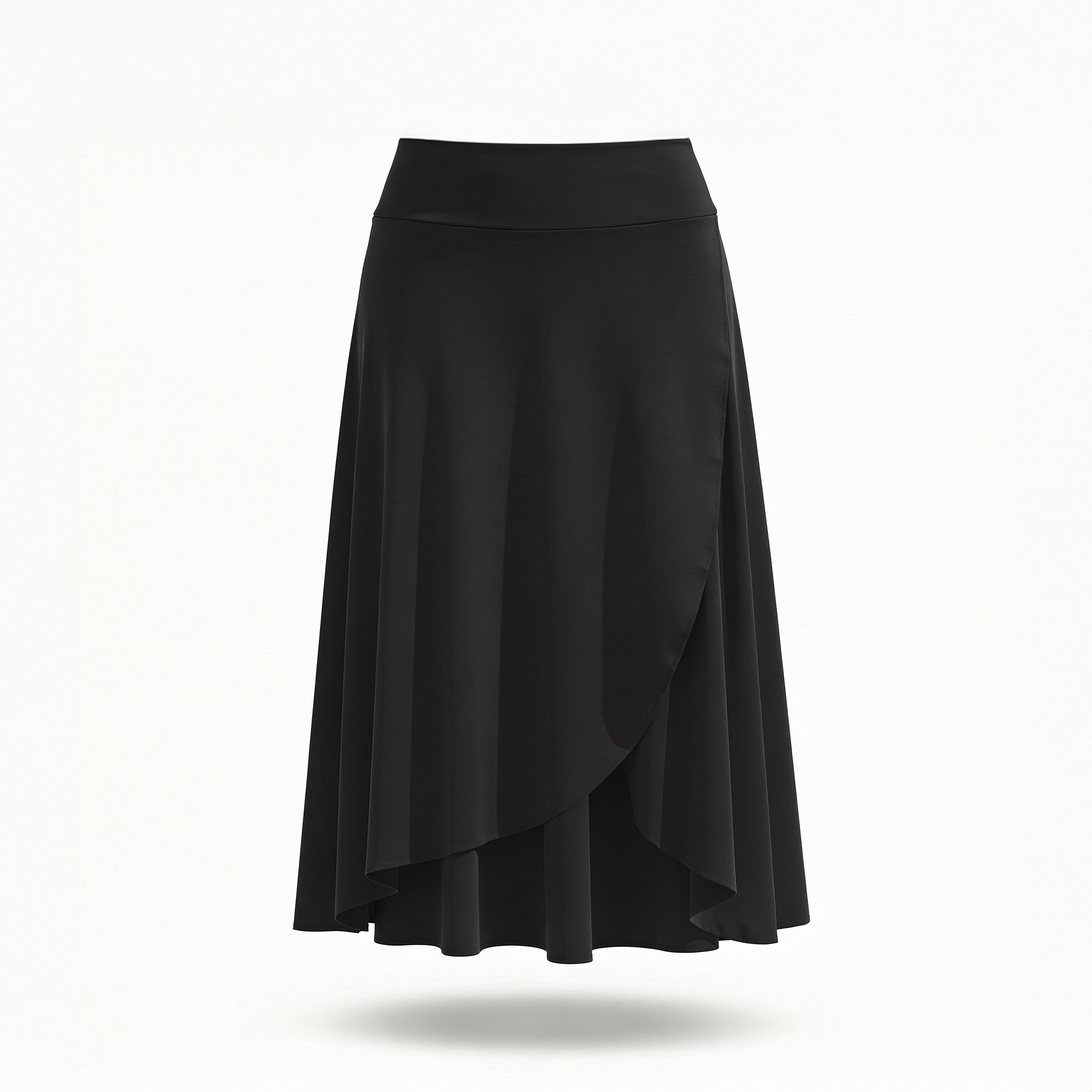 Black high-waisted flow skort with built-in shorts worn by a woman moving freely inside a sunlit stone heritage home in Deir El Qamar
